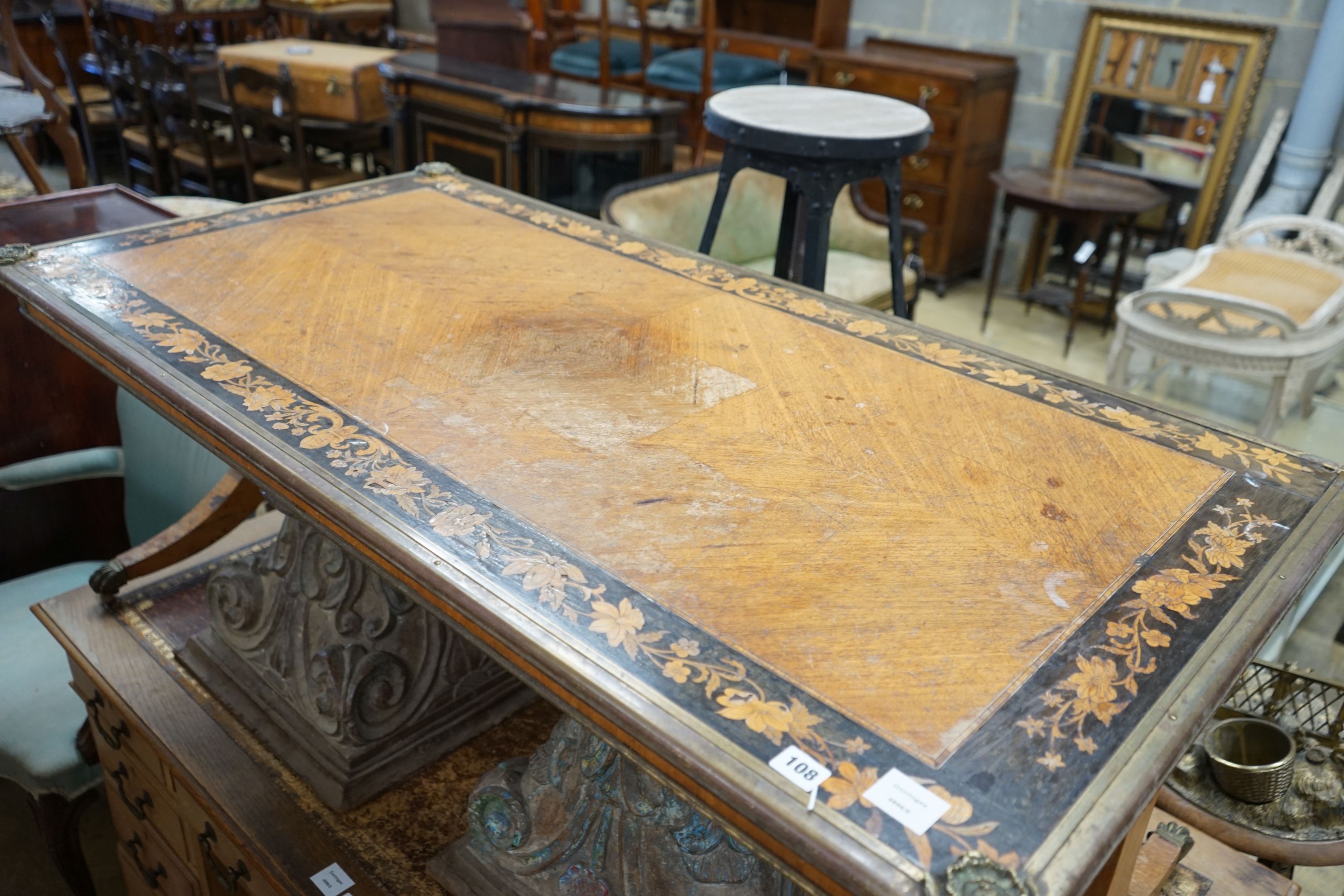 A 19th century French rectangular gilt metal mounted marquetry inlaid kingwood table top, now as coffee table, length 142cm, depth 72cm, height 53cm